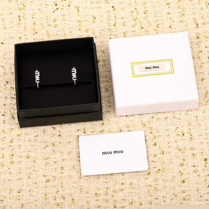 Ch*el earrings
